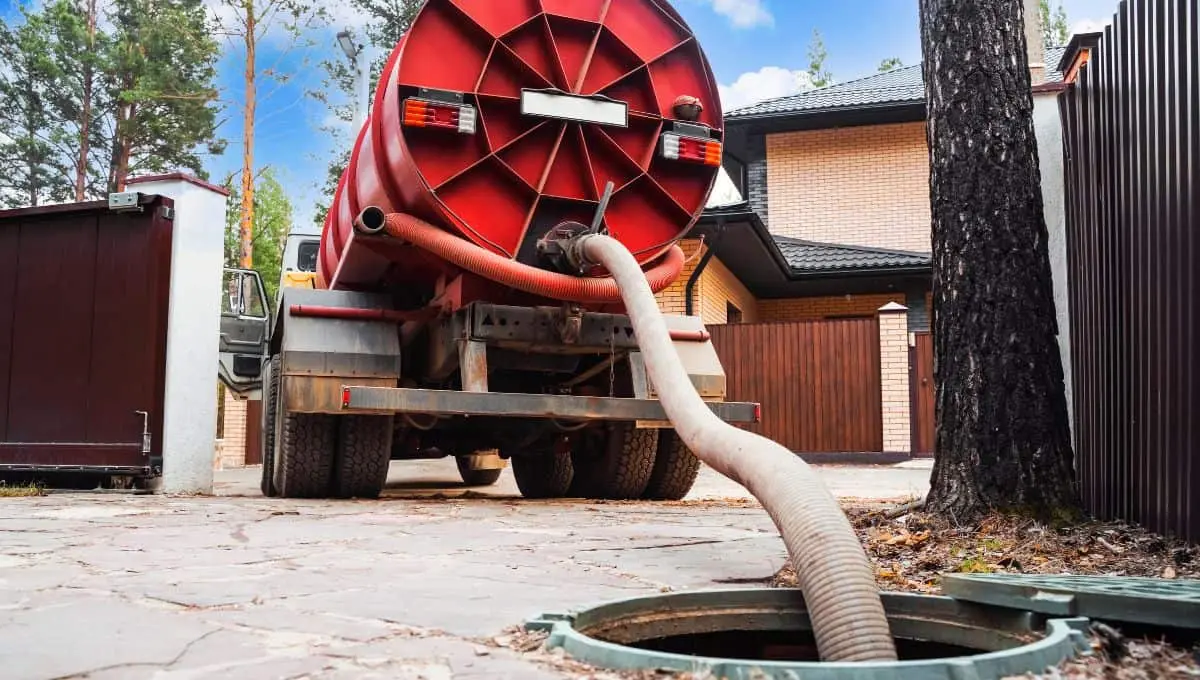 Septic tank pumping truck servicing an Aerated Wastewater Treatment System (AWTS)
